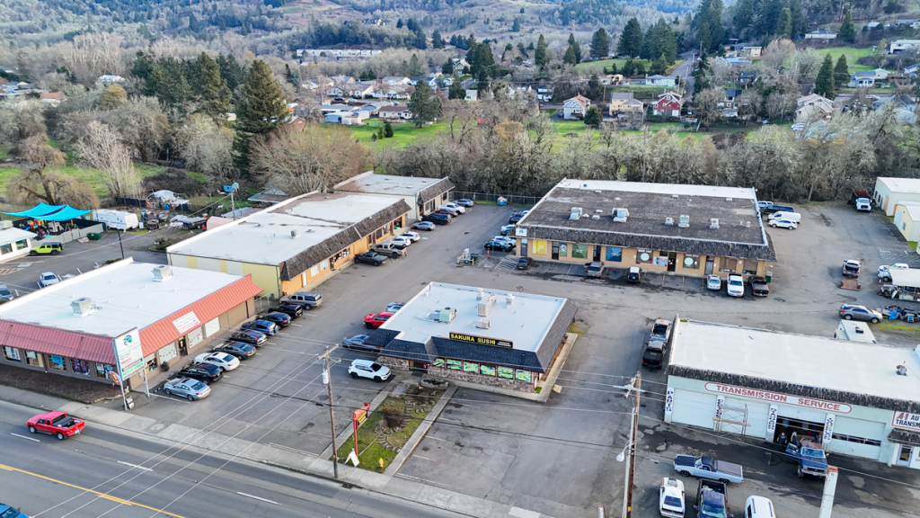 drone image of explore engage enjoy pediatric clinic behind sakura sushi kids therapy garden valley boulvard roseburg oregon