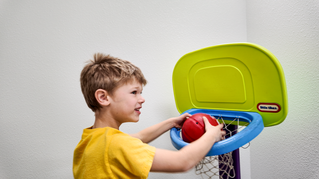 slam dunk in toy basketball hoop physical therapy clinic southern oregon roseburg explore engage enjoy pediatric therapy